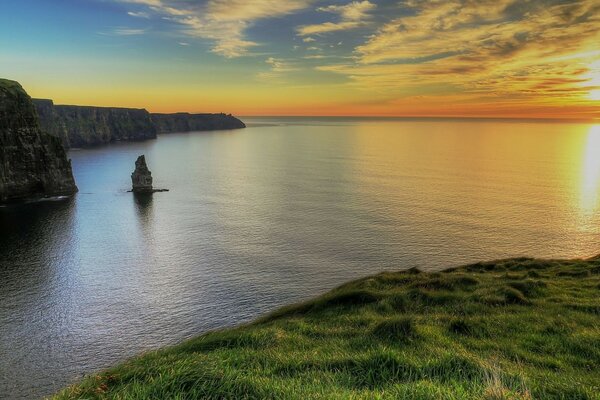 Calm sea under the rays of sunset