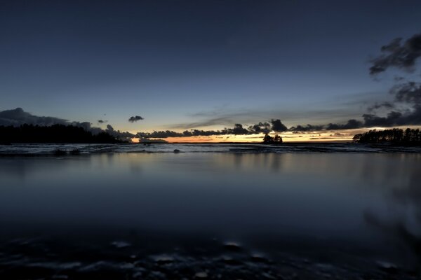 Reflection of the night sky on the water surface