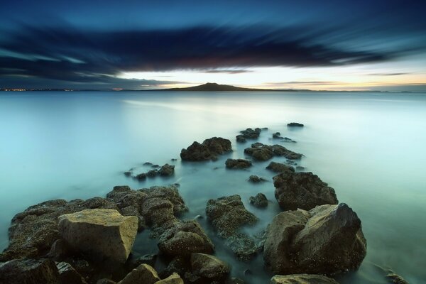 A mysterious road made of stones in the middle of the ocean