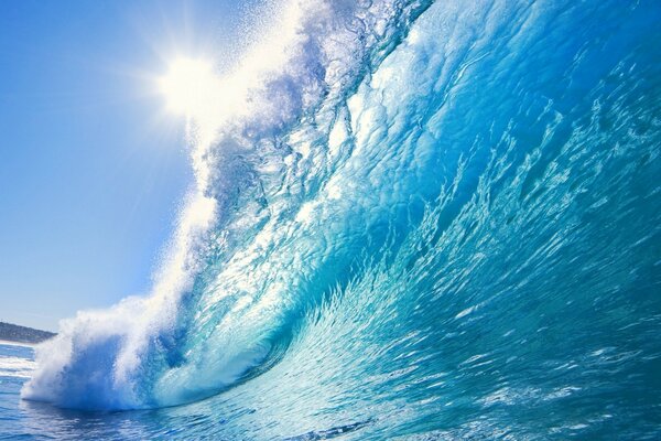 A big wave on a sunny day