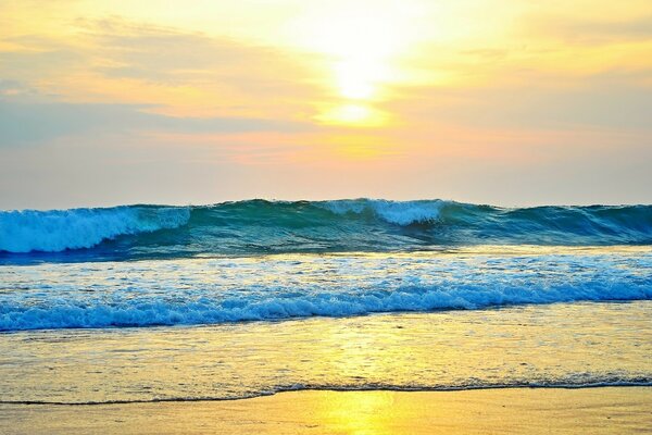 Sea waves. Reflection of the sun in the water