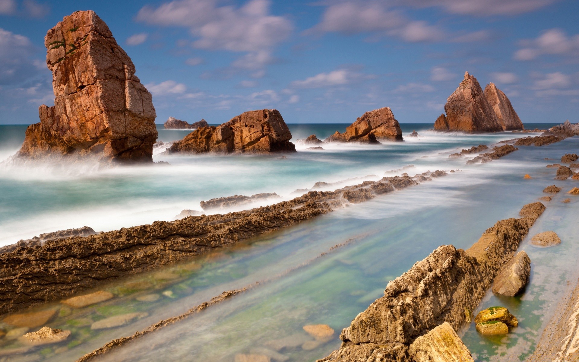 mer et océan voyage eau mer rock mer plage ciel océan paysage nature à l extérieur scénique sable surf roches coucher de soleil paysage été