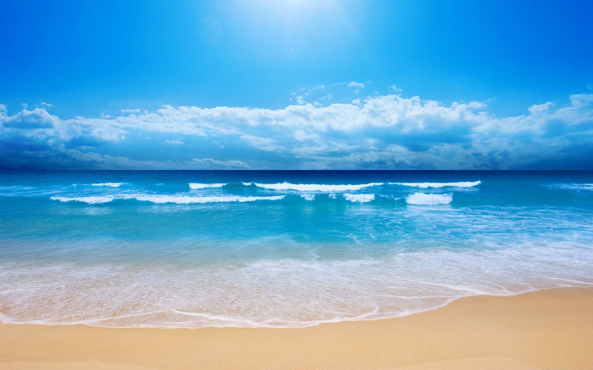 sea and ocean sand water tropical beach summer surf sun travel fair weather seashore sea sky seascape ocean nature turquoise relaxation idyllic vacation