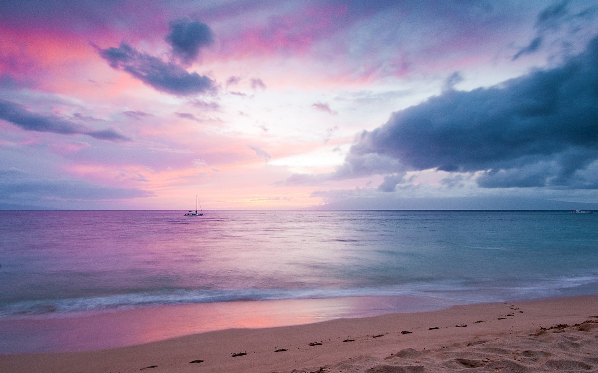 sea and ocean water sand beach sunset sea summer ocean sun seashore tropical fair weather travel dawn nature seascape sky dusk landscape