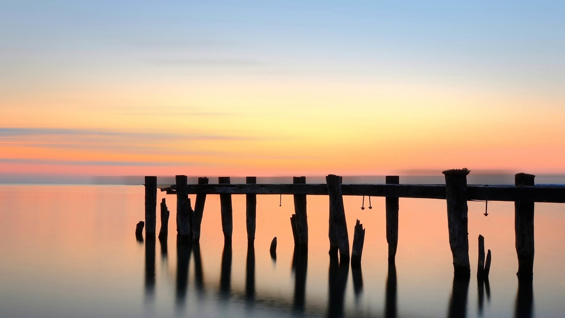 morze i ocean zachód słońca świt woda słońce niebo na zewnątrz zmierzch plaża morze odbicie molo most natura spokój podróże wieczór lato ocean dobra pogoda