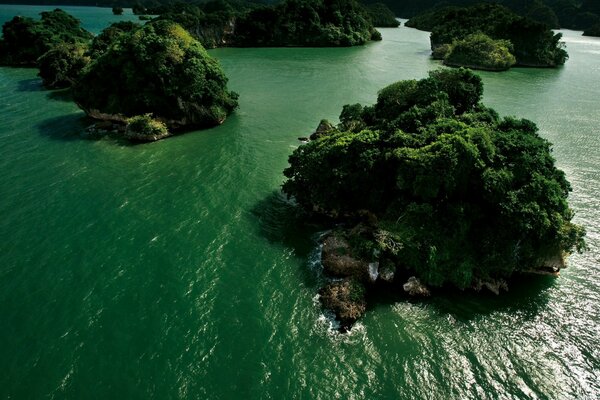 Rocky tropical islands washed by the sea