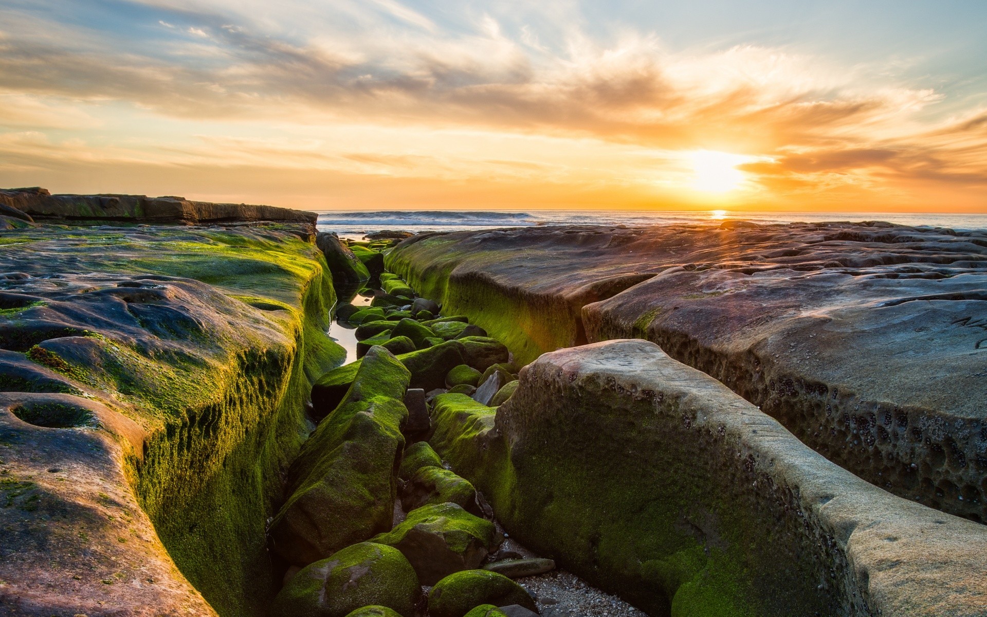 sea and ocean water sunset sea landscape beach ocean seashore sky nature dawn travel evening rock outdoors dusk seascape