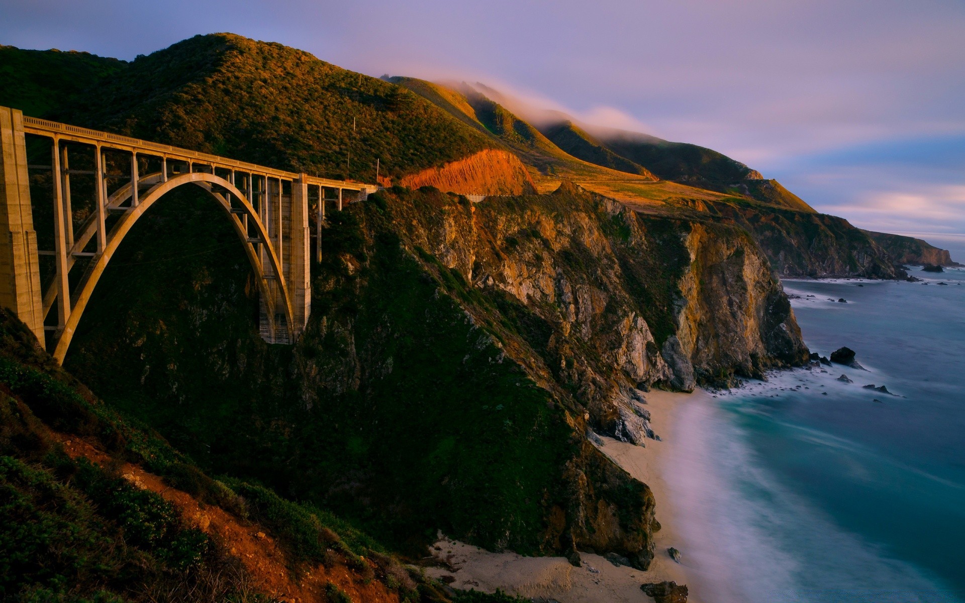 sea and ocean water landscape travel bridge seashore rock river mountain nature ocean outdoors sunset sea beach sky