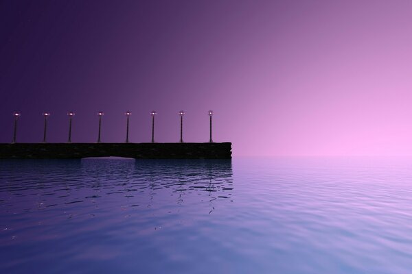 Sunrise on the sea blue water and purple-pink sky