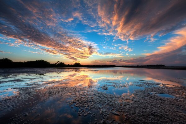 The raging sky is reflected in the water