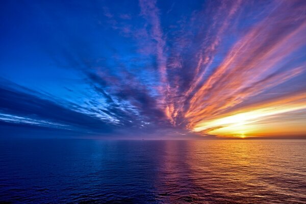 Sunset and feather clouds