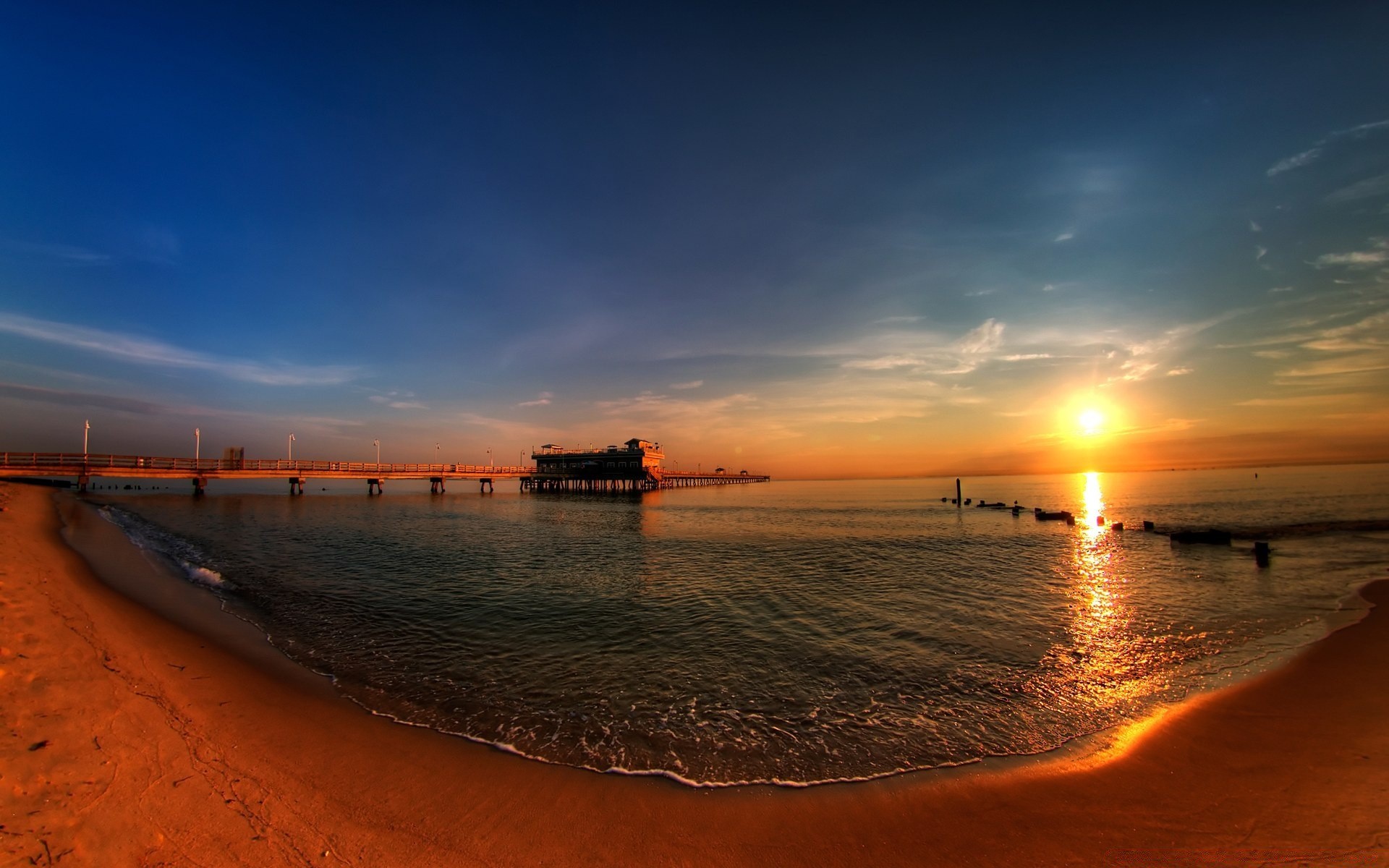 sea and ocean sunset dawn water sun sea beach dusk ocean sky evening seascape reflection sand summer fair weather travel boat seashore silhouette landscape