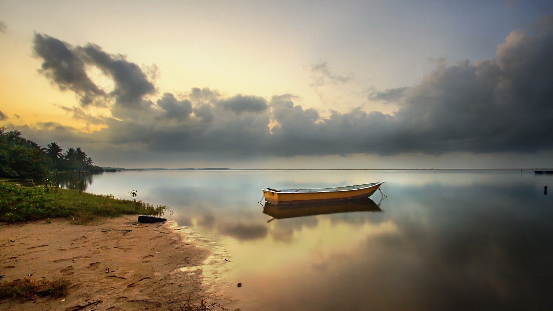 coucher de soleil et aube coucher de soleil eau aube plage lac ciel paysage soleil réflexion mer océan voyage crépuscule soir nature bateau paysage