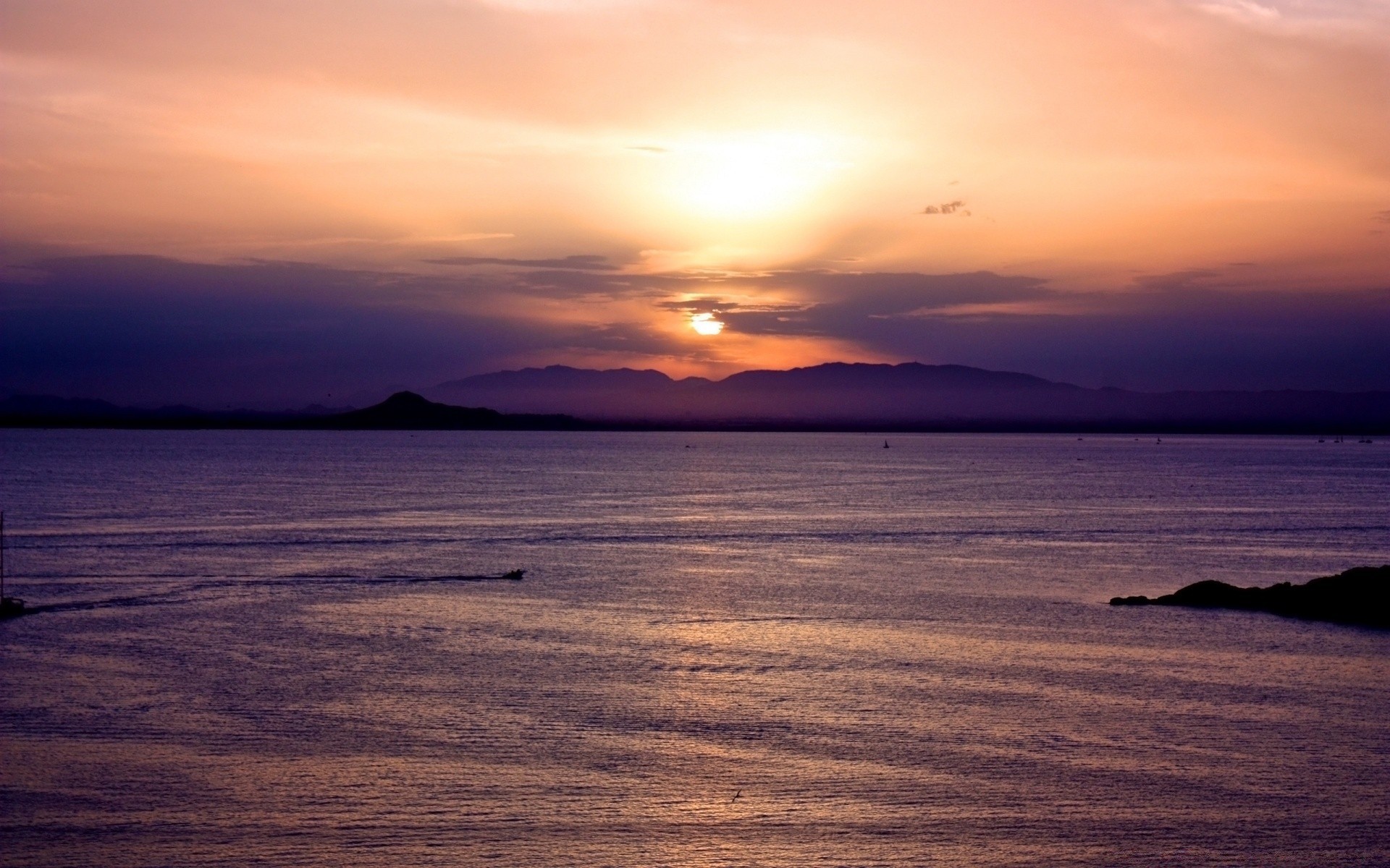 sea and ocean sunset dawn sun water dusk evening beach sea ocean seascape fair weather reflection silhouette sky nature landscape