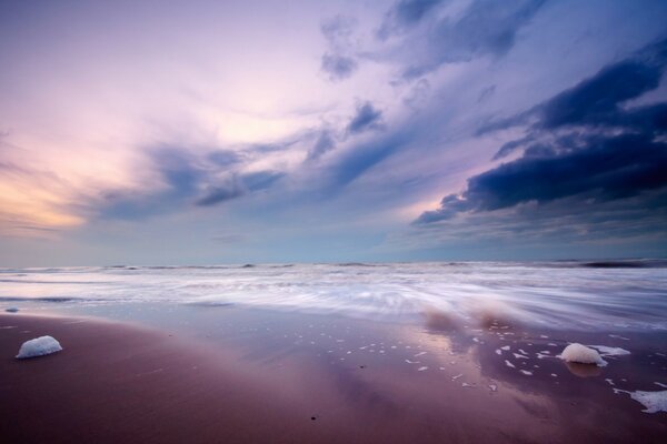 Sandstrand vor Sonnenuntergang Hintergrund