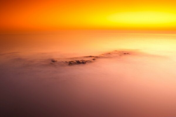 Océano y cielo largo impacto