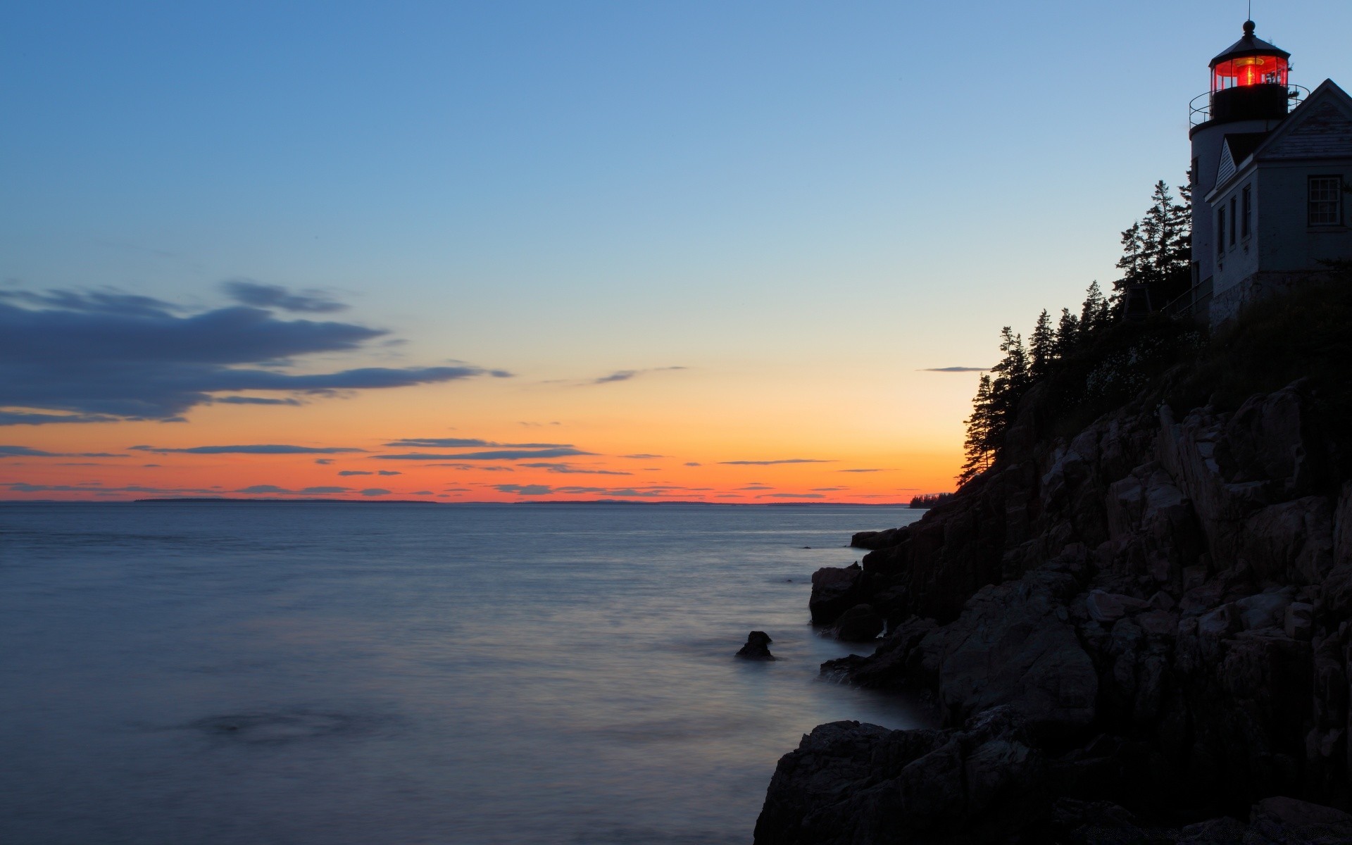 sea and ocean sunset water lighthouse dawn sea evening dusk travel ocean seashore beach landscape outdoors light sky