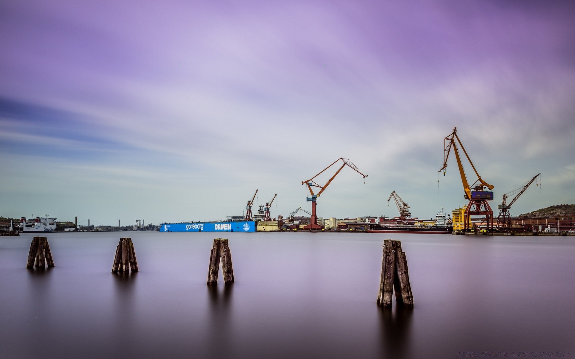 mer et océan eau port industrie jetée expédition organisation navire bateau ciel coucher de soleil mer grue système de transport rivière entreprise port bateau voiture