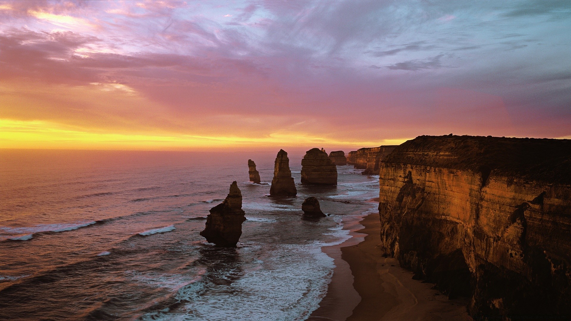 sea and ocean sunset water dawn beach dusk sea seashore ocean evening travel landscape seascape sun sky rock outdoors sand