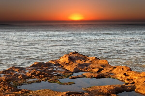 Sunset at dusk on the sea and ocean