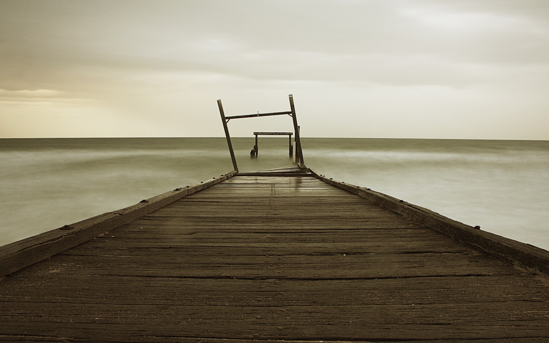 meer und ozean strand ozean meer wasser pier sonnenuntergang meer promenade sand holz landschaft liegeplatz sonne himmel landschaft natur see reisen aus holz dämmerung