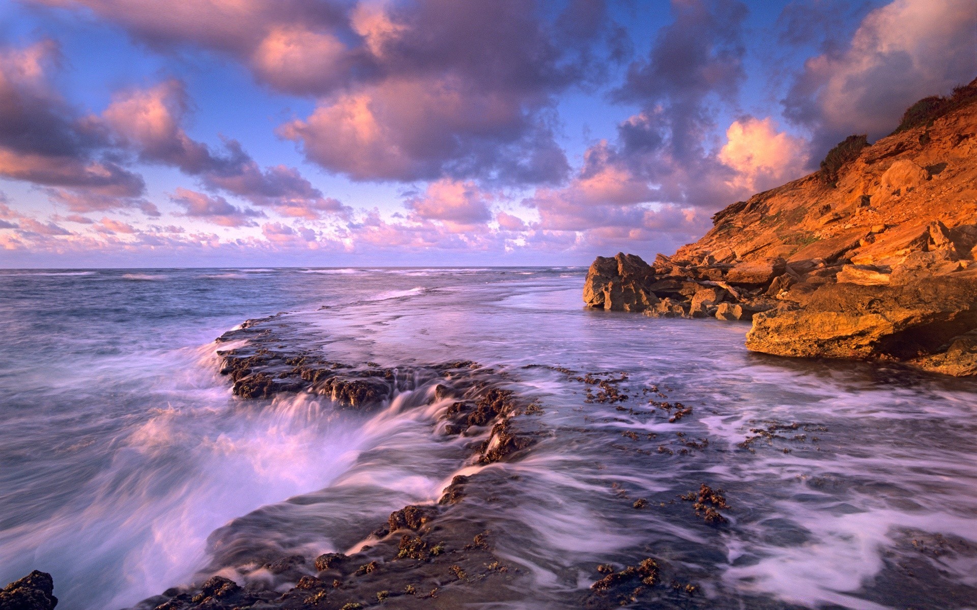 sea and ocean sunset water dusk evening ocean beach sea seashore dawn seascape sky landscape sun travel nature rock fair weather