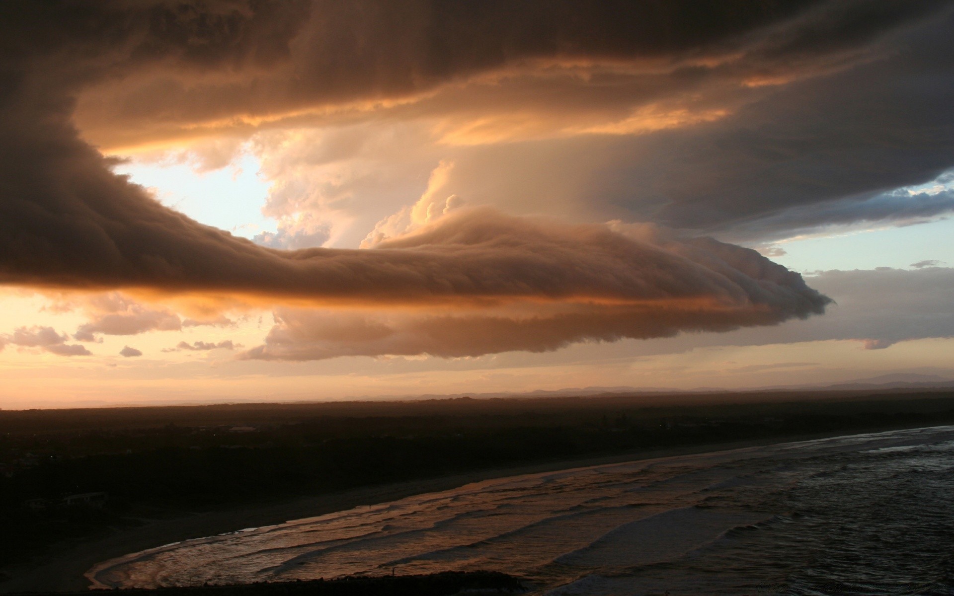 sea and ocean sunset water dawn evening dusk storm landscape sky beach sea ocean travel nature sun