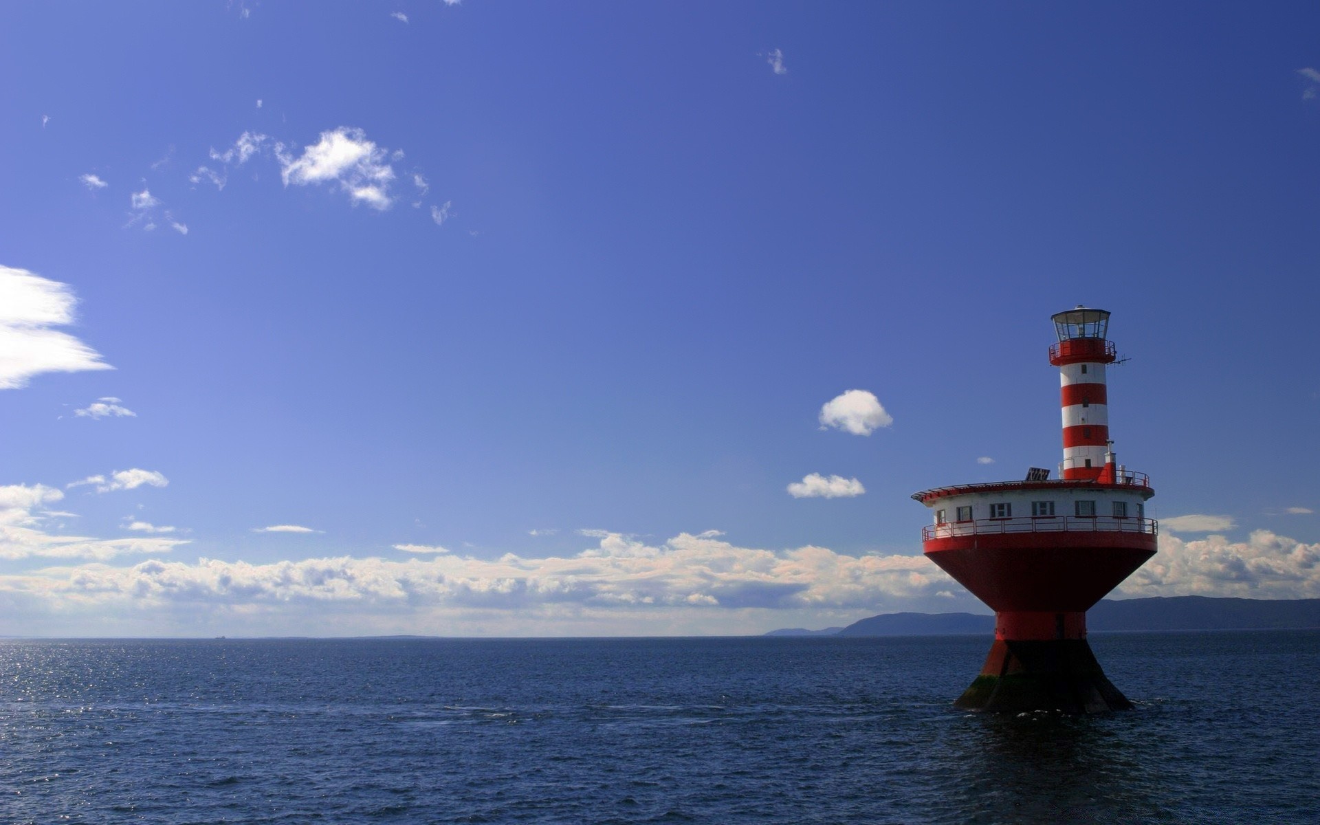 海洋和海洋 水域 灯塔 海 旅游 海洋 天空 户外 船只 海洋 运输系统 船 汽车 夏天 海滩