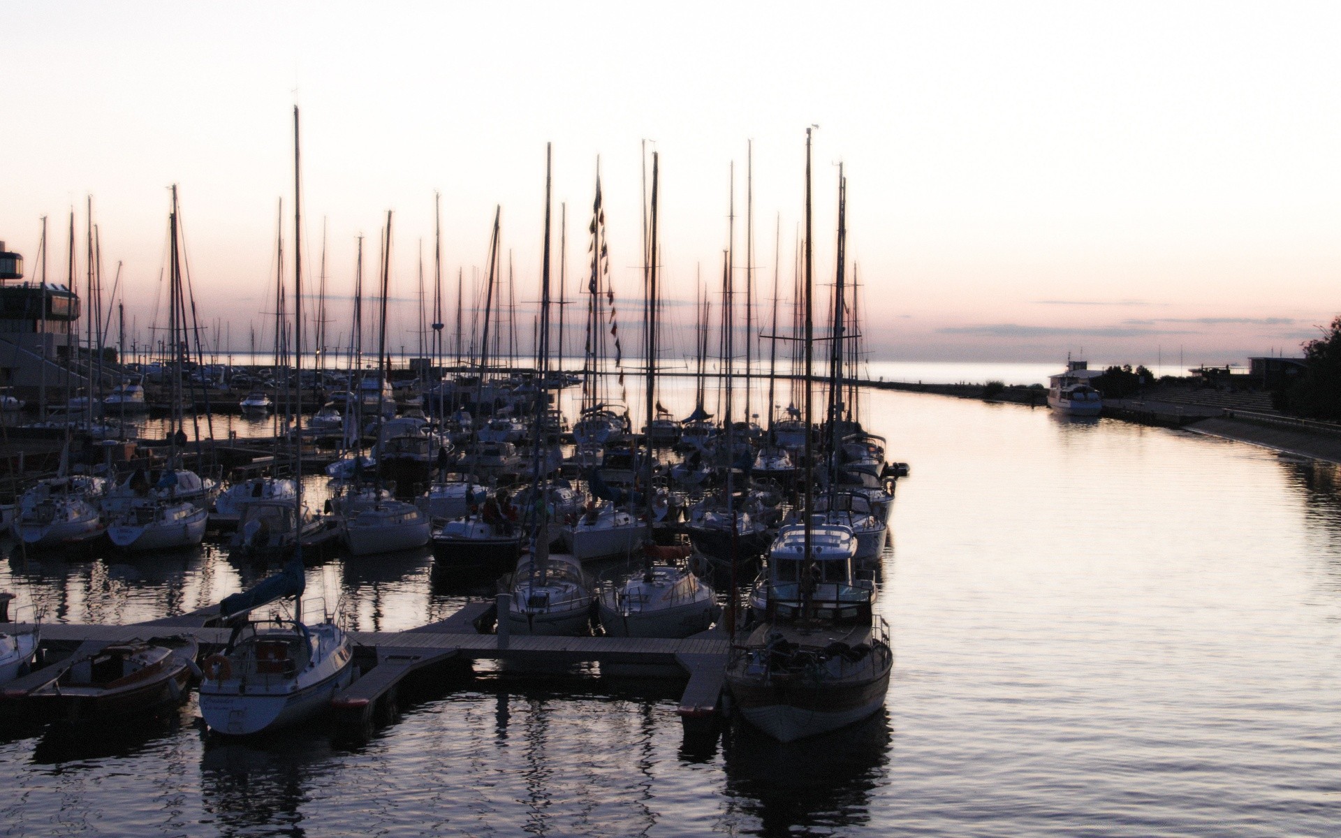 sea and ocean water watercraft transportation system vehicle river travel harbor boat pier sea reflection ship city sky dawn sailboat canal marina