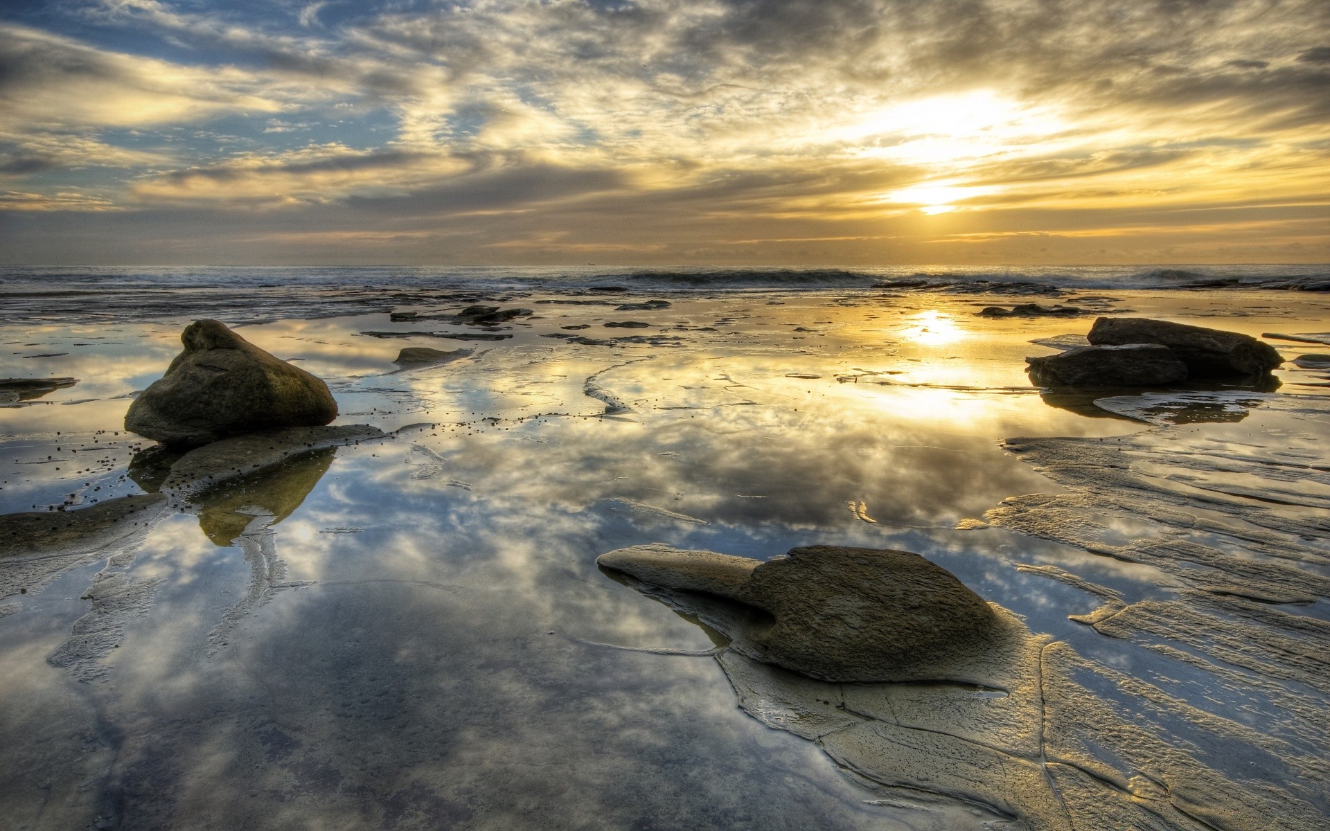 sea and ocean water beach sunset sea ocean seashore evening rock dawn dusk sun seascape sky reflection sand surf travel composure landscape