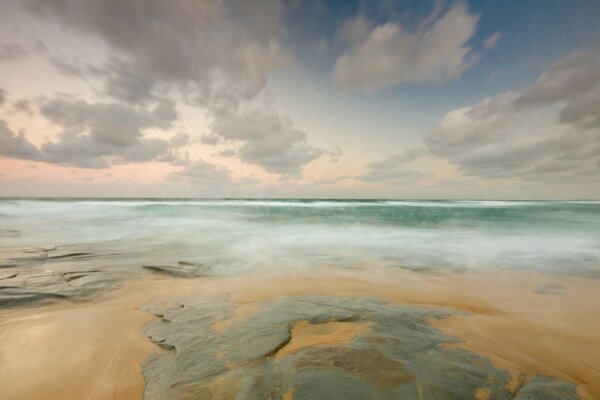 Sandy beach with the sea in the distance