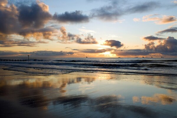 The sea at dawn with beautiful clouds