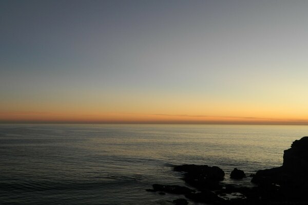 Gradient sunset on the horizon at sea