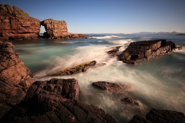 Sea surf at the rocks