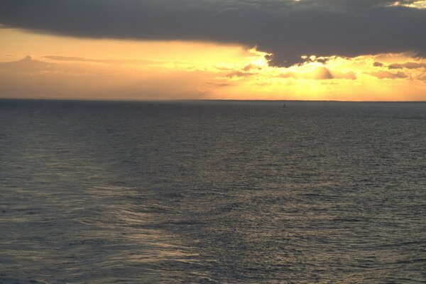 Beautiful yellow sunset on the sea