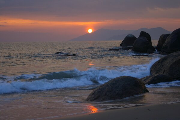 Very beautiful sunset on the beach on the ocean