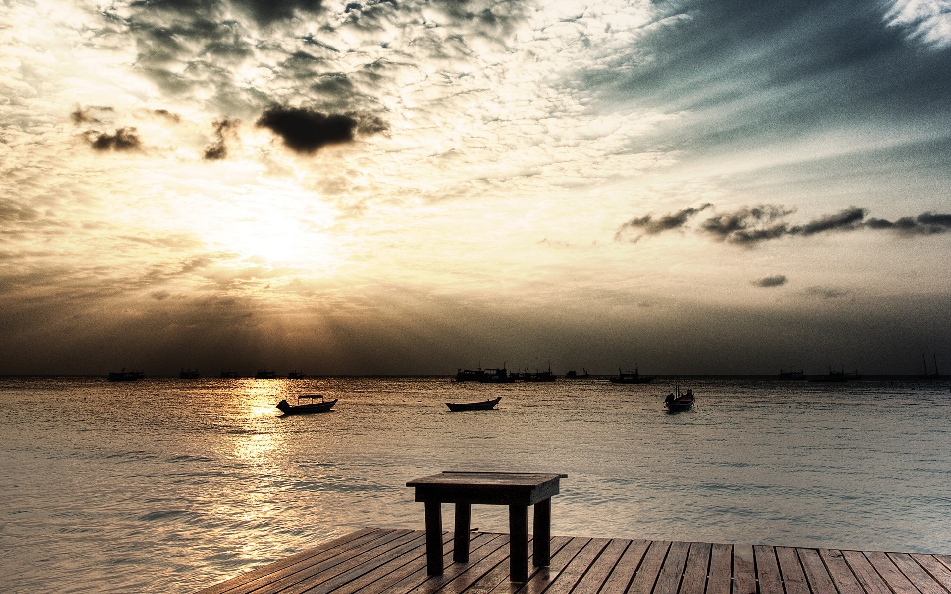 sea and ocean water beach sunset sea dawn ocean sun seascape pier landscape seashore sky evening reflection nature sand cloud summer jetty