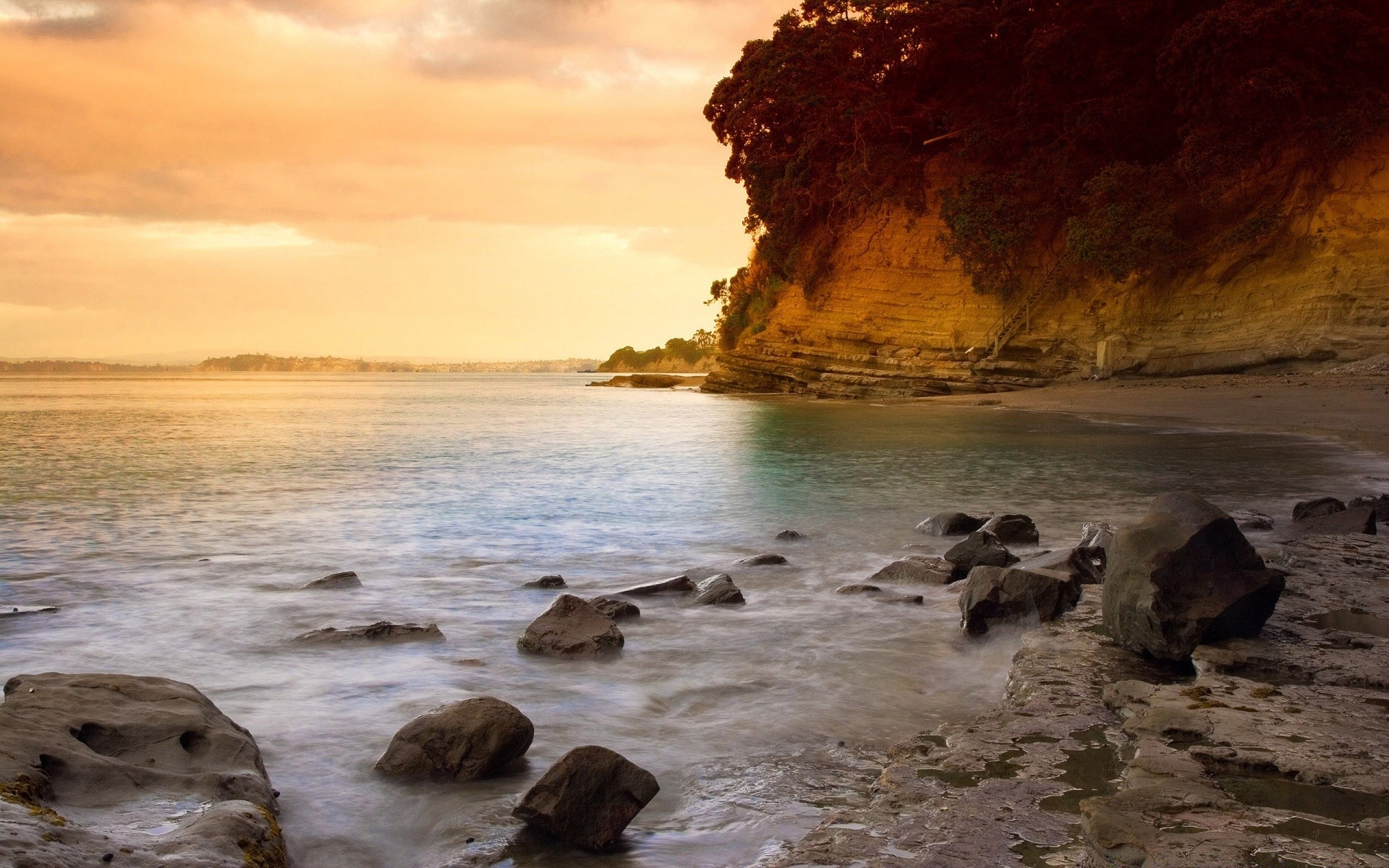 sea and ocean water beach seashore sunset ocean surf sea travel dusk sand dawn sky rock evening outdoors sun nature