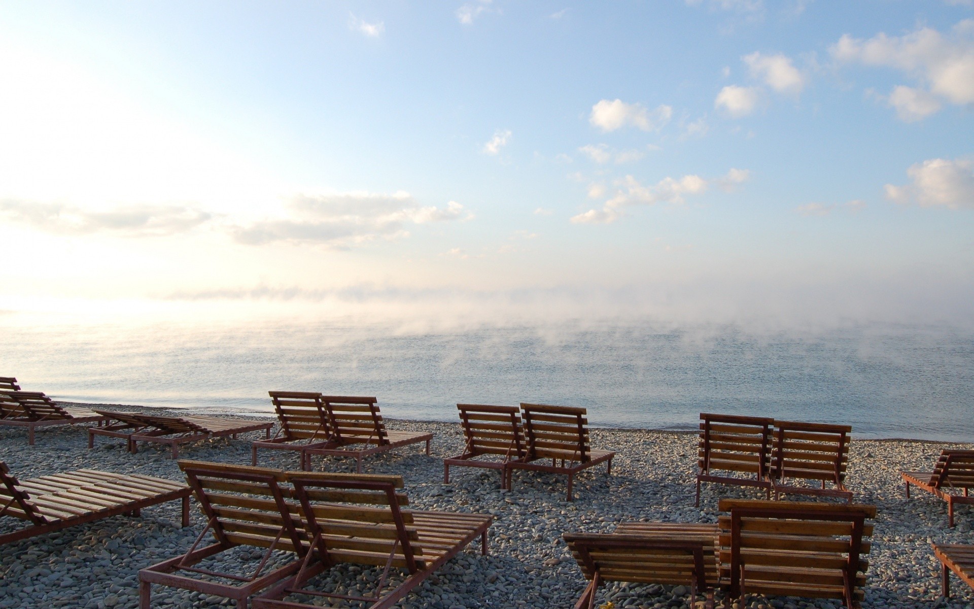 sea and ocean beach sea water travel seashore ocean chair sky outdoors seat landscape sun