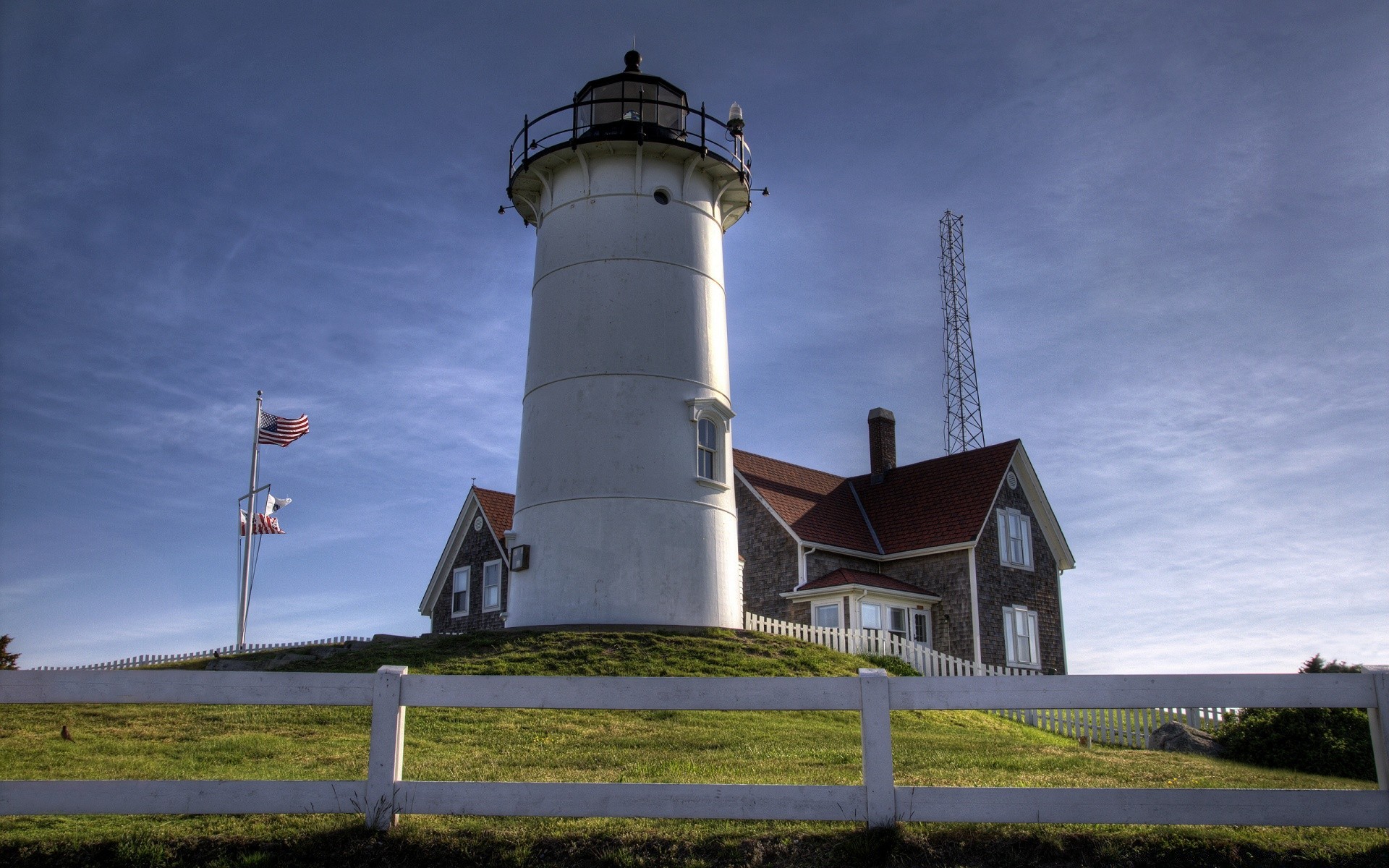 sea and ocean lighthouse sky outdoors travel architecture landscape grass windmill tower building daylight agriculture farm