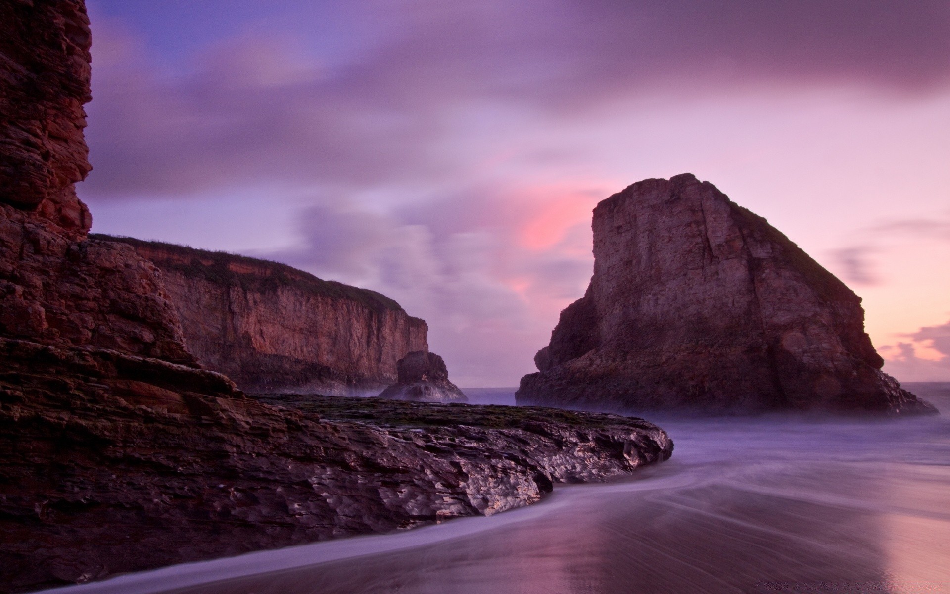 sea and ocean sunset water travel dawn sky landscape nature beach outdoors dusk evening ocean sea rock seashore