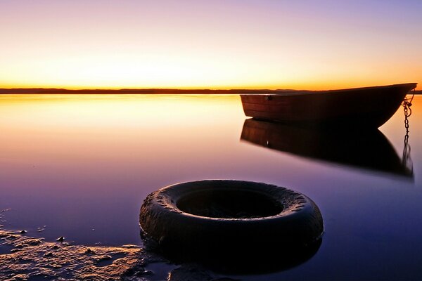 A boat on a calm sea surface