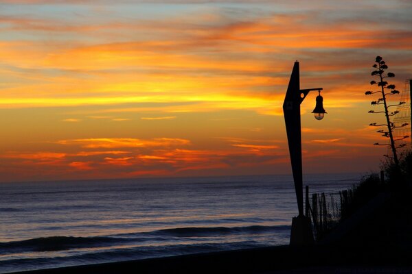 Lonely beach lantern evokes nostalgia