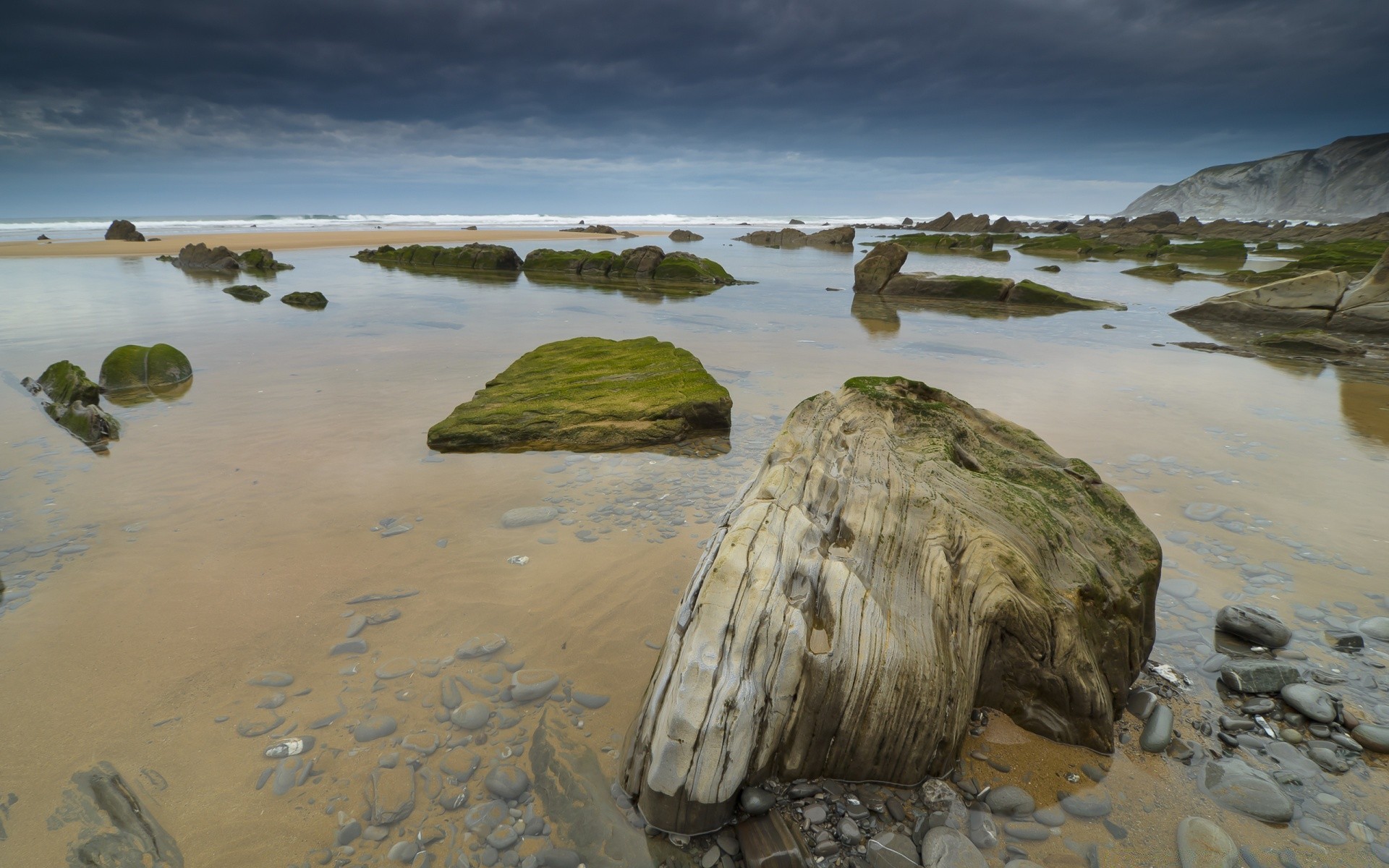 sea and ocean water beach seashore sea ocean travel sand landscape summer nature sky outdoors shore island rock reflection