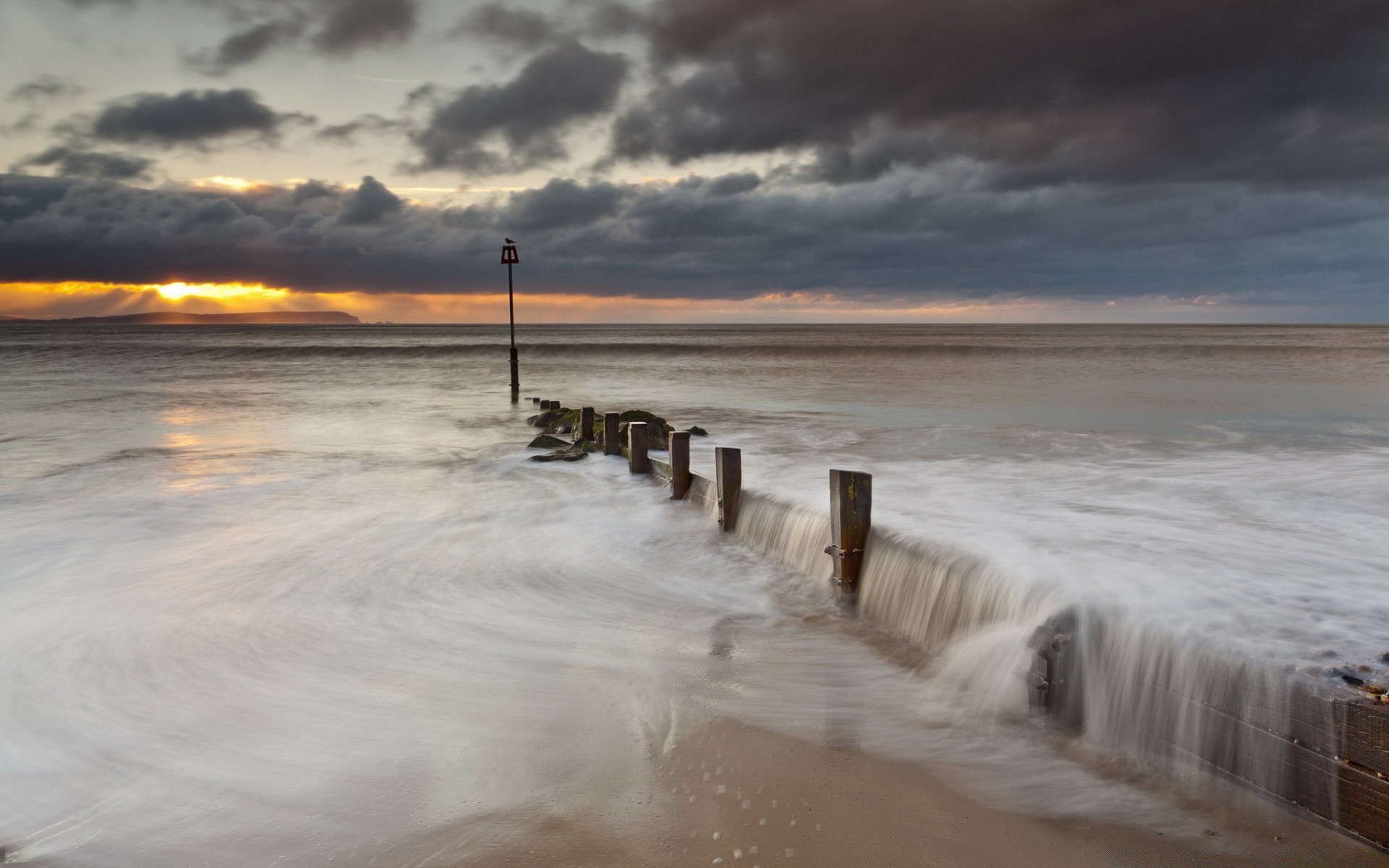 sea and ocean water beach sea ocean seashore surf wave storm sand travel sunset seascape outdoors sky dawn tide pier summer leisure