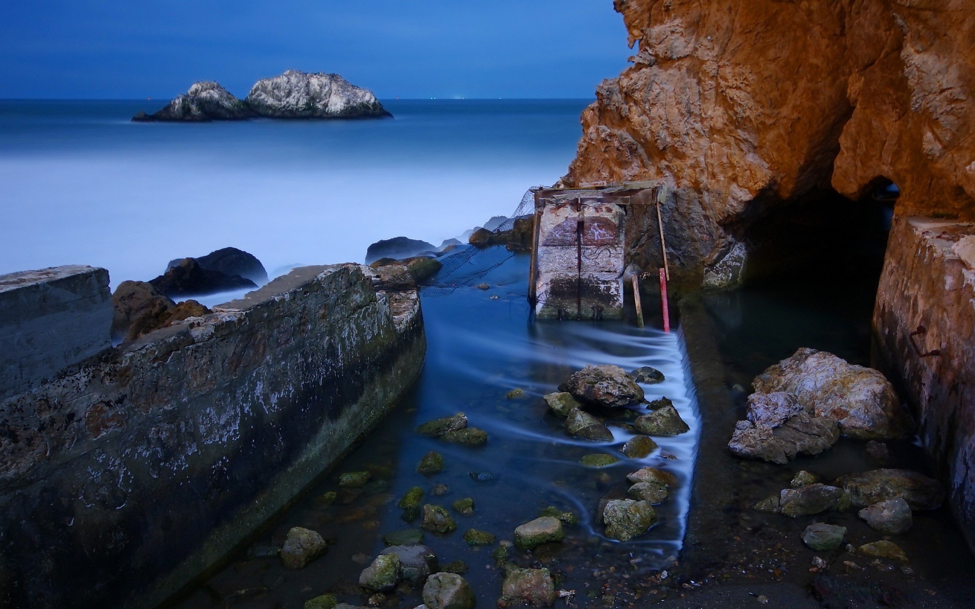 sea and ocean water seashore rock sea travel ocean beach landscape scenic outdoors seascape nature island light daylight