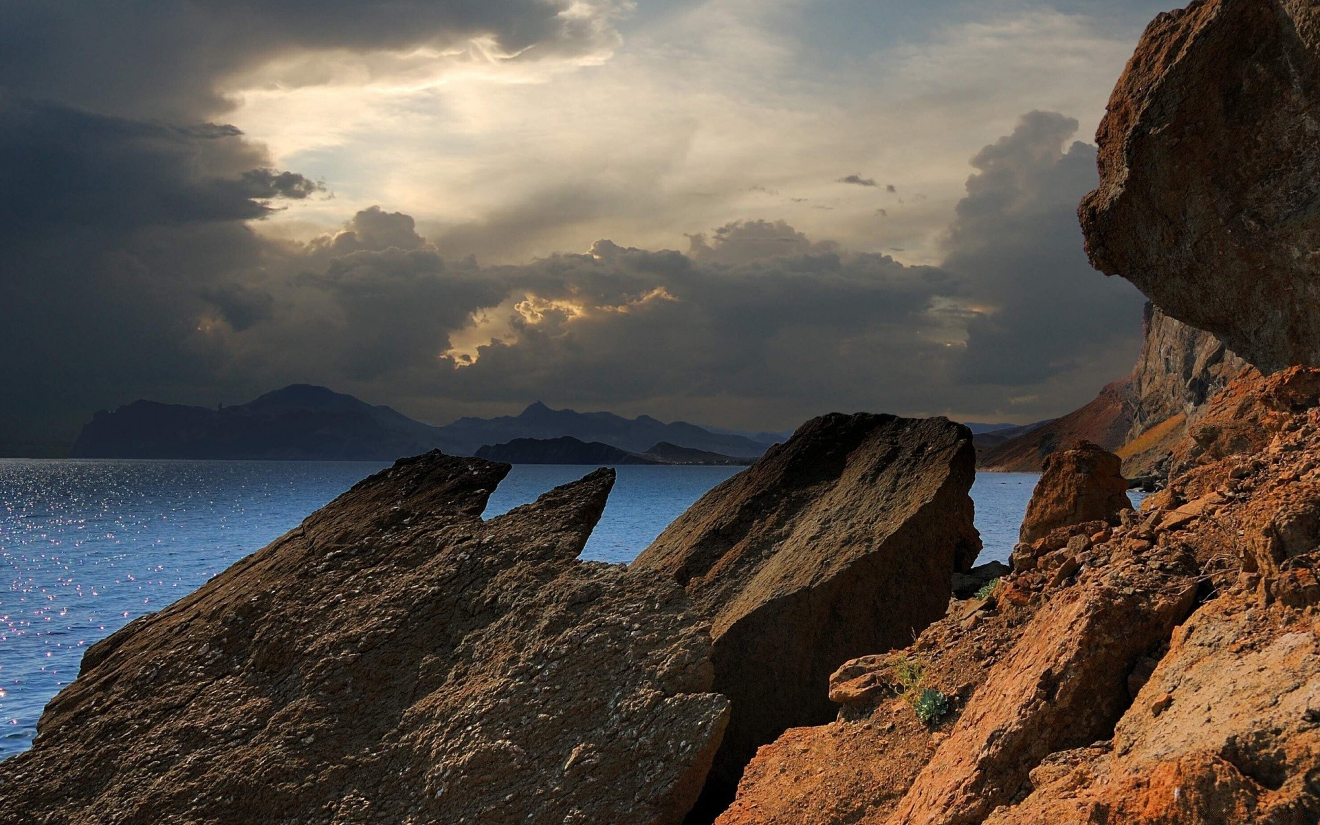 sea and ocean water sunset sea landscape travel seashore beach ocean sky outdoors nature rock dawn seascape