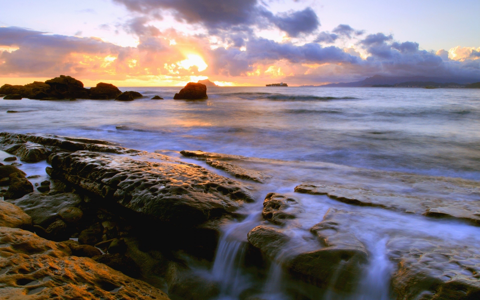 sea and ocean water sunset evening dusk landscape dawn beach sea seashore ocean travel rock seascape nature sky reflection river outdoors photograph