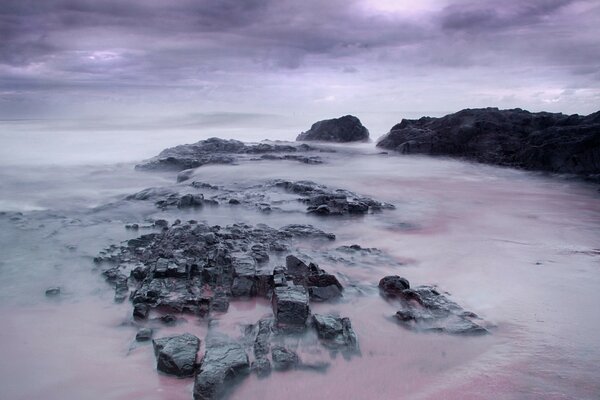 Ocean of water in the early foggy morning