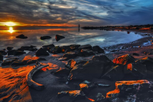 Sunset beach stones sea